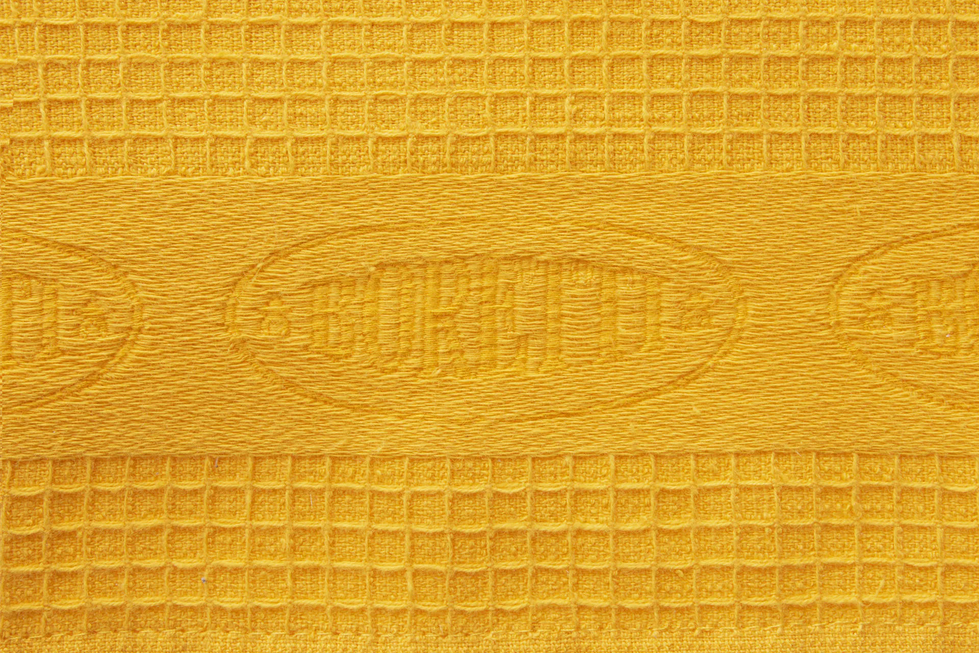 BTKDGE_Img_ImgPrdPho_DetailShot_towelyellowlogo_2000px
